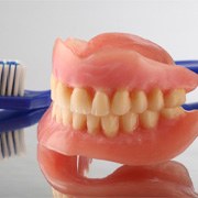a toothbrush and dentures in West Palm Beach