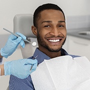 A young man smiling in preparation to see his dentist in West Palm Beach