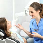 patient talking to dental hygienist