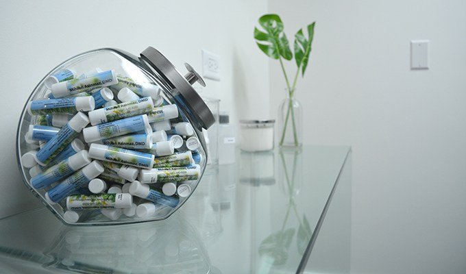 Jar of dental office branded lip balms