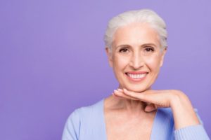 Smiling woman with healthy dental implants in West Palm Beach