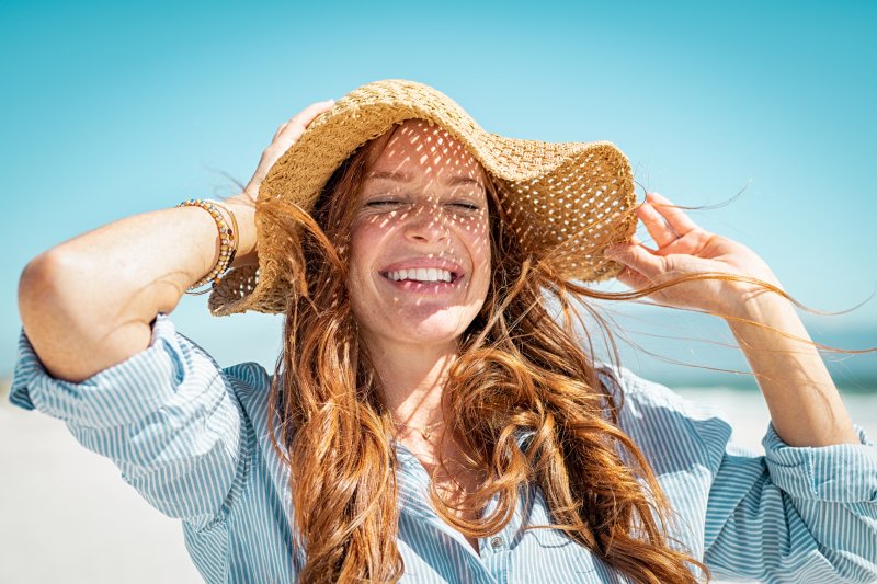 Smiling woman on beach