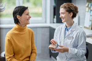 a patient attending their dental implant consultation