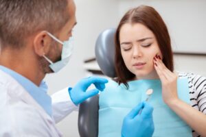 a woman visiting her emergency dentist